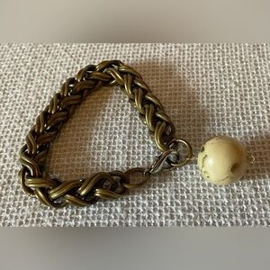 Rope bracelet with hanging bead